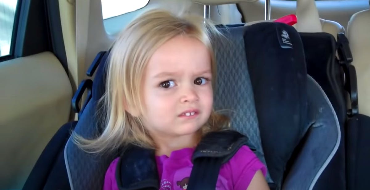 a meme photo of a little girl making a funny face